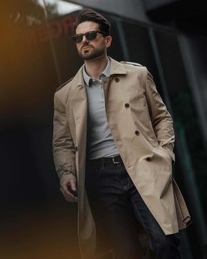 Beige Trench Coat with Grey Polo and Black Jeans