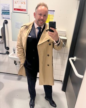 Beige Trench Coat with Pinstripe Suit