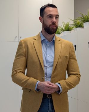 Mustard Blazer with Blue Shirt and Slim Blue Jeans